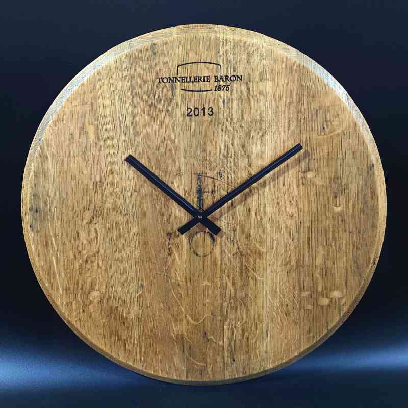 Wall clock made from old wine barrel lid